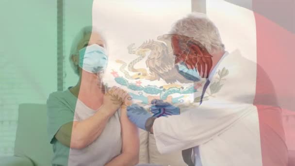 墨西哥国旗在医生之上的动画接种病人在面具 Coronavirus Covid 19大流行病数字视频期间的保健和保护 — 图库视频影像