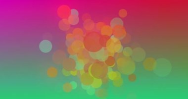 Canlı arka planda birden fazla renkli noktanın animasyonu. Renk ve hareket kavramı dijital olarak oluşturulmuş video.