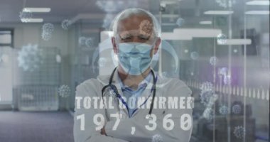 Yüz maskesi takan bilim adamlarıyla birlikte yüzen kovid 19 hücrelerinin animasyonu. Coronavirus covid 19 salgını sırasında sağlık ve korunma, dijital olarak üretilen video