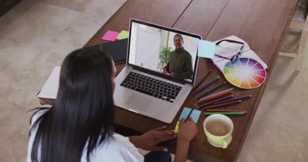 Caucasian Female Student Using Computer Video Call Male Teacher Writing — Stock Video