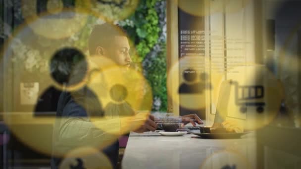 Meerdere Digitale Iconen Tegen Afro Amerikaanse Man Die Koffie Drinkt — Stockvideo