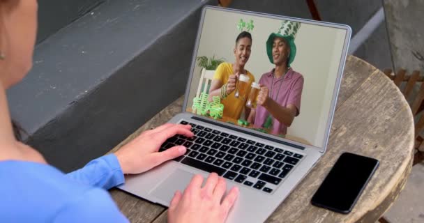 Caucasian Woman Home Using Laptop Making Video Call Patrick Day — Stock Video