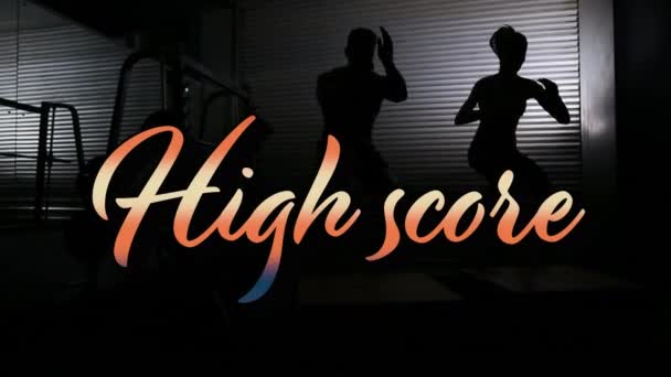 Animation High Score Text Gradient Orange Man Woman Jumping Gym — Stock Video