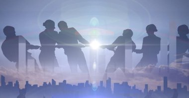 Şehir manzarasına ip çeken iş adamlarının kompozisyonu ve arka planda parlayan güneş. küresel iş ve finans, bağlantı ve ağ konsepti dijital olarak oluşturulmuş görüntü.