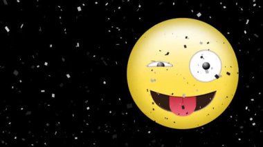 Animation of confetti falling over emoji winking and sticking tongue out on black background. social media, digital interface, global connection and celebration concept digitally generated video.
