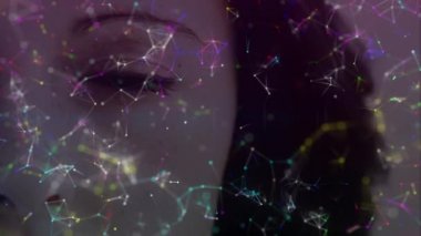 Animation of glowing spot and network of connections over woman's face. digital interface, identity recognition and global technology concept digitally generated video.