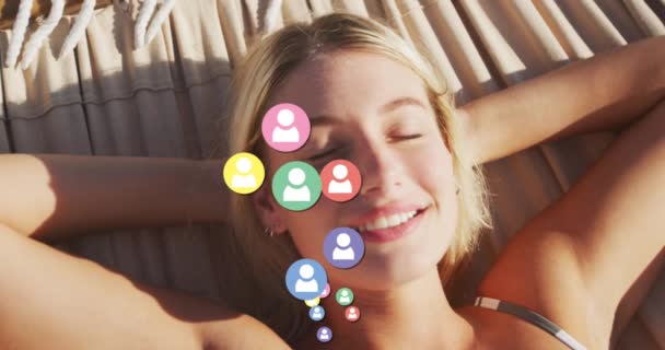 Multiple Profile Icons Floating Portrait Caucasian Woman Laying Hammock Beach — Video