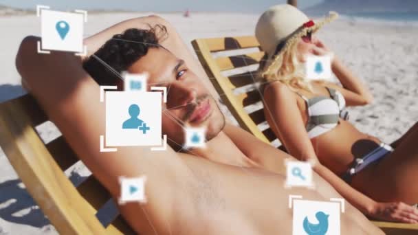 Animation Social Media Icons Couple Deckchairs Beach Digital Interface Social — Vídeos de Stock