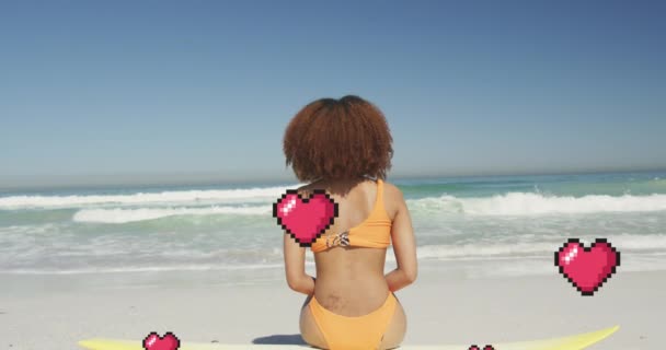Animation Heart Digital Icons Woman Sitting Surfboard Beach Digital Interface — Αρχείο Βίντεο