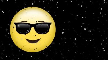 Animation of confetti falling over emoji with sunglasses on black background. social media, digital interface, global connection and celebration concept digitally generated video.
