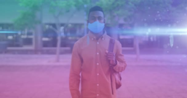 Blue Light Spots Portrait African American Man Wearing Face Mask — Stock Video
