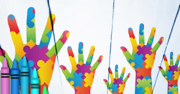 Анимация Цветных Карандашей Над Руками Образованными Головоломками Аутизм Трудности Обучением — стоковое видео