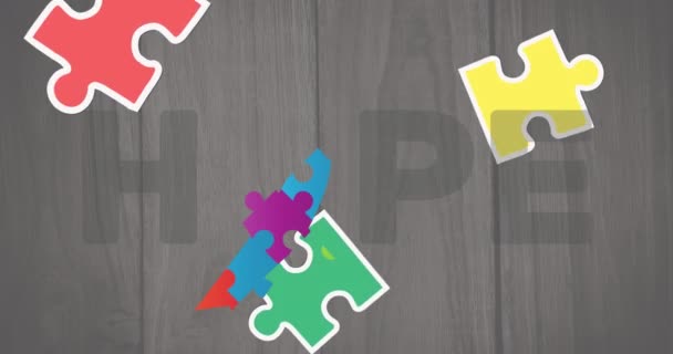 Анимация Текста Надежды Лентой Образованной Головоломками Сером Фоне Аутизм Трудности — стоковое видео