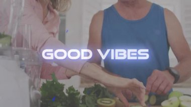 Neon iyi titreşimler beyaz yaşlı bir çiftin evdeki mutfakta sebze doğramasına karşı. emeklilik son sınıf yaşam tarzı konsepti