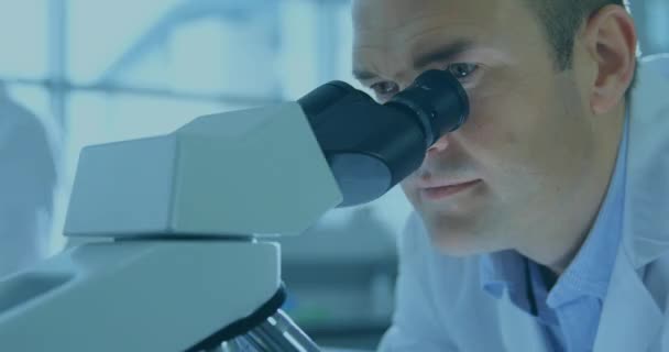 Animation Scopes Scanning Data Processing Screens Male Scientist Using Microscope — Stock Video