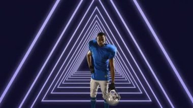 Amerikan futbolcunun neon üçgen tünelin üzerinde miğfer tutuşu animasyonu. Spor ve yarışma konsepti dijital olarak oluşturulmuş video.