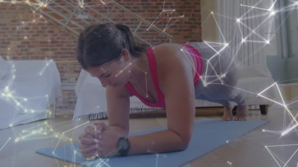 Glowing Network Connections Caucasian Woman Performing Plank Exercise Home Sports — Stockvideo