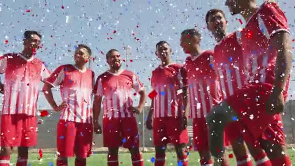 Colorful Confetti Falling Team Male Soccer Players Smiling Together Grass — 图库视频影像