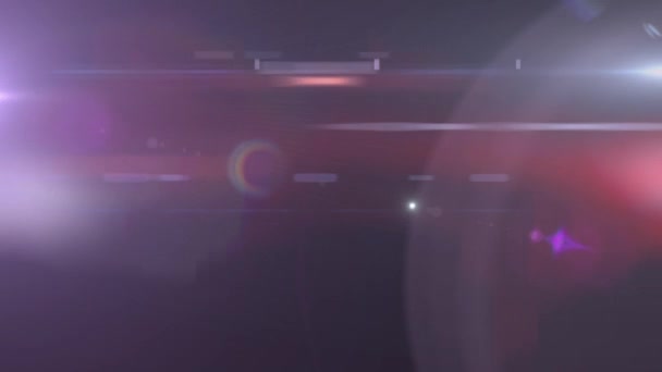 Kırmızı Siyah Arkaplanda Parlayan Mercekli Bir Işık Animasyonu Işık Renk — Stok video