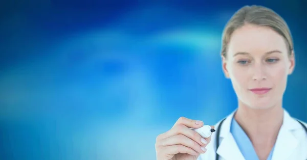 Caucasian Female Doctor Writing Invisible Screen Blue Gradient Background Healthcare — Stock Photo, Image