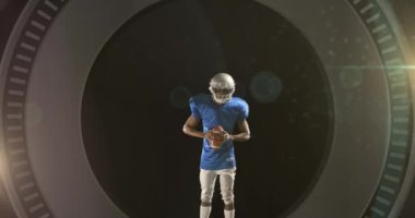 Siyah arka planda ragbi topu tutan kask takan erkek ragbi oyuncusu. spor ve teknoloji konsepti