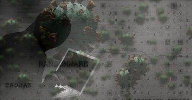 Kapüşonlu bilgisayar korsanının Covid hücreli ve fidye virüsü mesajlı bilgisayarı kullanmasının bileşimi. küresel koronavirüs salgını ve siber güvenlik konsepti dijital olarak oluşturuldu.