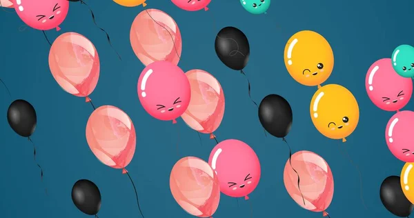 Composition Multiple Black Pink Yellow Balloons Faces Blue Background Party — Foto Stock