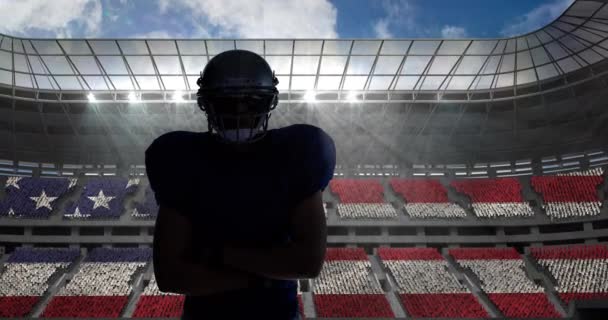 Animacja Amerykańskiego Piłkarza Amerykańską Flagą Nad Stadionem Sportowym Wydarzenie Sportowe — Wideo stockowe