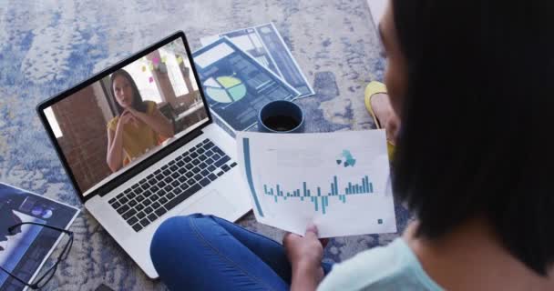 African American Woman Holding Document Having Video Call Female Colleague — Stock Video