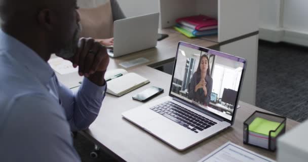 African American Senior Man Having Video Call Female Colleague Laptop — Stock Video