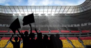 Spor taraftarlarının siluetleri Alman bayrağıyla spor stadyumunda tezahürat yapıyor. Spor etkinliği ve yarışma konsepti dijital olarak oluşturulmuş video.