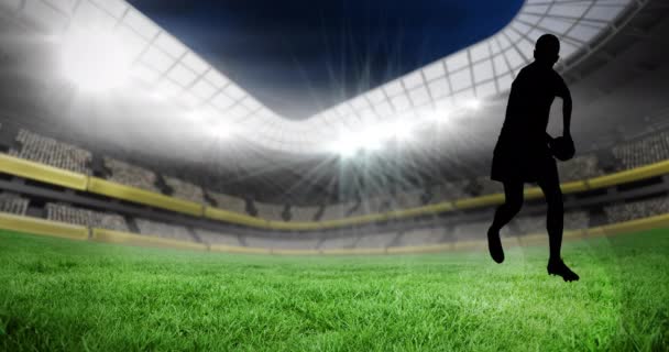 Animation Der Silhouette Eines Rugbyspielers Der Ball Über Leere Tribünen — Stockvideo