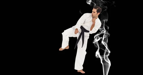 Composición Artista Karate Marcial Masculino Con Cinturón Negro Pateando Sobre —  Fotos de Stock