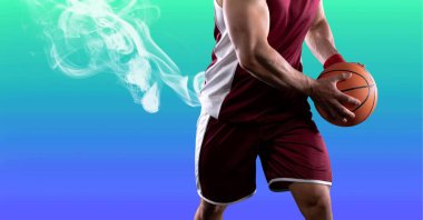 Kafkas erkek basketbolcunun fotokopi alanı olan bir kompozisyonu. spor ve yarışma konsepti dijital olarak oluşturulmuş görüntü.