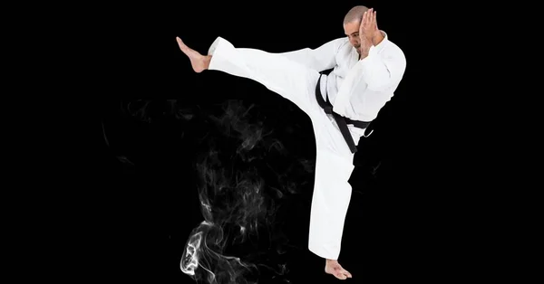 Composición Artista Karate Marcial Masculino Con Cinturón Negro Pateando Sobre — Foto de Stock