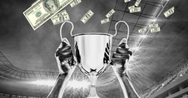 Stadyumda düşen renkli banknotlarla el ele tutuşmanın tek renkli kompozisyonu. spor ve rekabet finans kavramı dijital olarak oluşturulmuş görüntü.