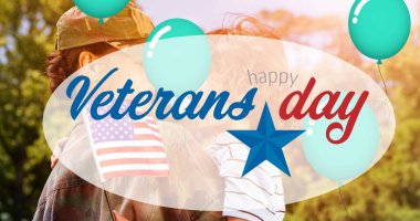 Gaziler günü mesajında gülümseyen oğlunu kucaklayan kadın askerin kompozisyonu. Asker, dijital olarak üretilen aile imajına geri dönüyor..