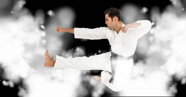 Composición Combate Karate Masculino Caucásico Sobre Fondo Negro Con Desenfoque — Foto de Stock