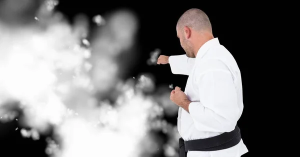 Kompozycja Kaukaskiego Zawodnika Karate Czarnym Tle Białą Plamą Mistrzostwa Sport — Zdjęcie stockowe