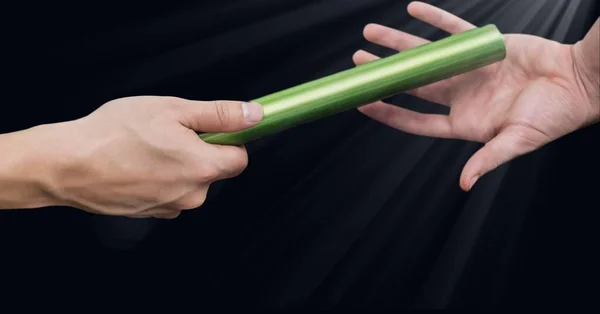 Composição Atletas Caucasianos Passando Baton Relé Verde Com Luz Brilhante — Fotografia de Stock