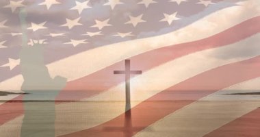 Amerikan bayrağının üzerinde hareket eden özgürlük heykeli ve haç animasyonu. Amerikan vatanseverliği ve din konsepti dijital olarak oluşturulmuş imaj.
