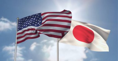 Mavi gökyüzünde Amerikan ve Japon bayrağı dalgalanır. uluslararası ilişkiler ve ilişkiler kavramı