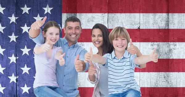 Composition Smiling Caucasian Couple Son Daughter Giving Thumbs American Flag — Stock Photo, Image