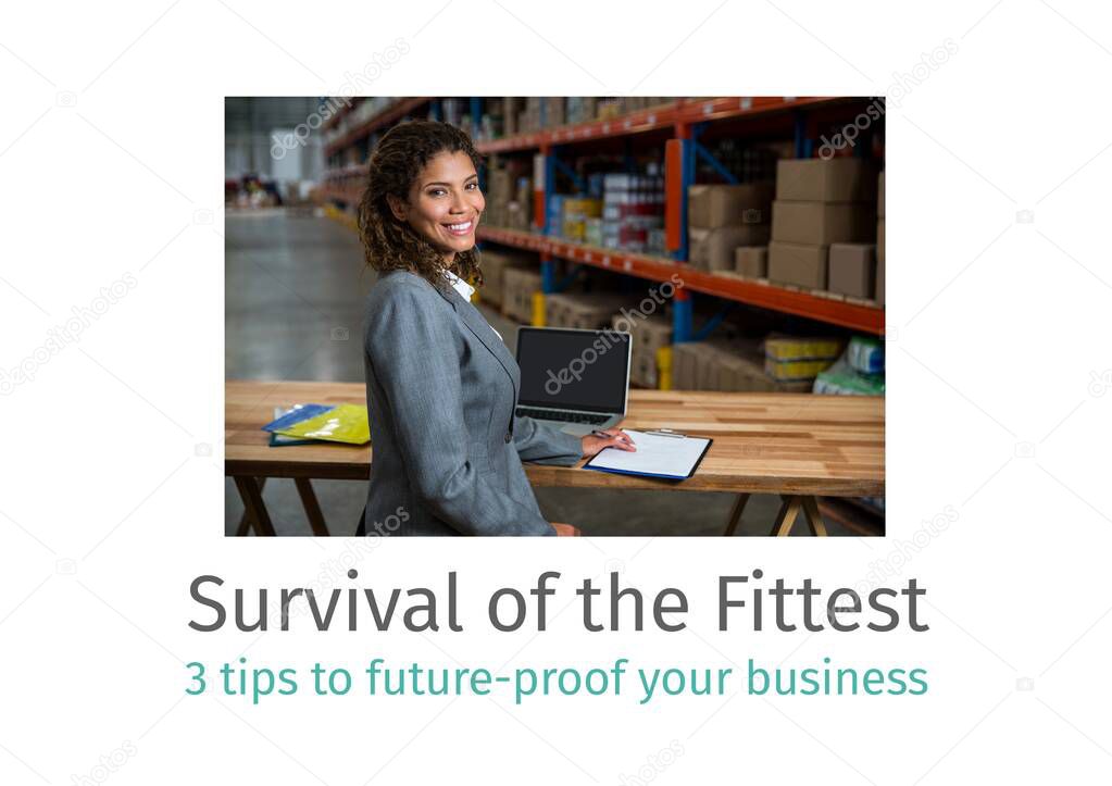 Composition of survival of the fittest text with smiling woman using laptop in warehouse, on white. business and marketing guide design template concept digitally generated image.