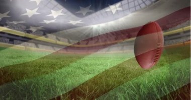Arka plandaki spor stadyumuna düşen rugby toplarının üzerinde Amerikan bayrağı sallıyordu. Spor yarışması ve turnuva konsepti