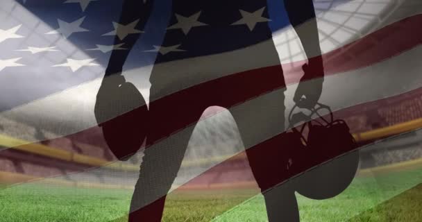 Amerikai Zászlót Lengetve Férfi Rögbi Játékos Felett Labdával Sisakkal Sportstadion — Stock videók