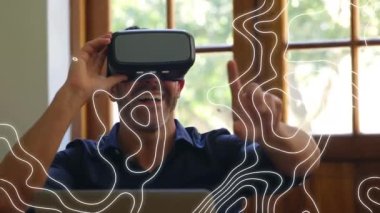 Evde VR kulaklık takan beyaz bir adama karşı topoğrafya. eğlence ve fütüristik teknoloji kavramı