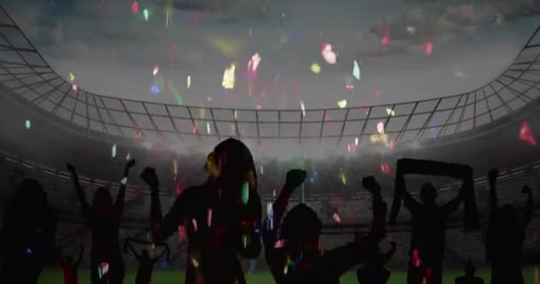 Kleurrijke Confetti Vallen Silhouet Van Fans Juichen Sportstadion Achtergrond Sportwedstrijd — Stockvideo