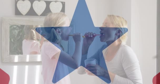 American Flag Design Pattern Pulsating Star Caucasian Mother Daughter Brushing — Stock Video