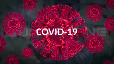 Uyarı üzerine covid 19 metin animasyonu ve kırmızı covid 19 hücre. küresel covid 19 salgın konsepti dijital olarak oluşturulmuş video.
